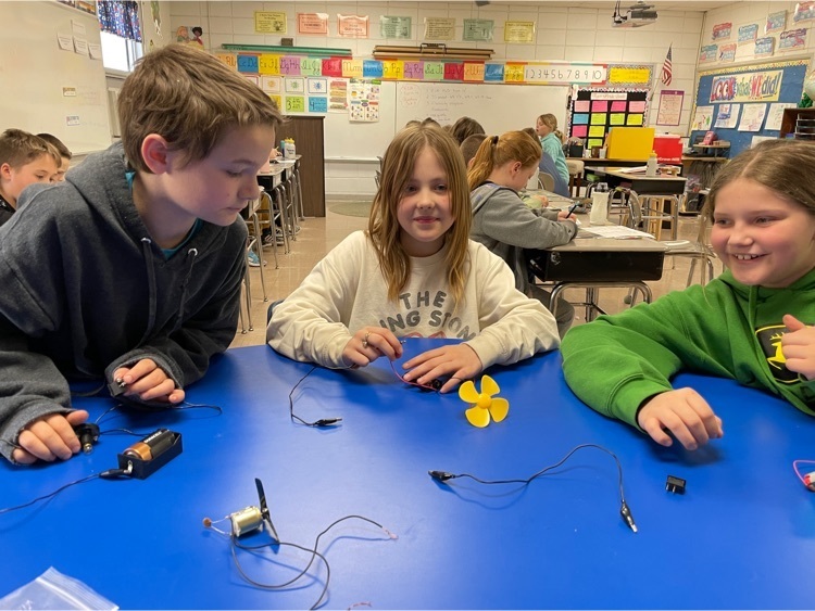 Fourth graders making circuits.